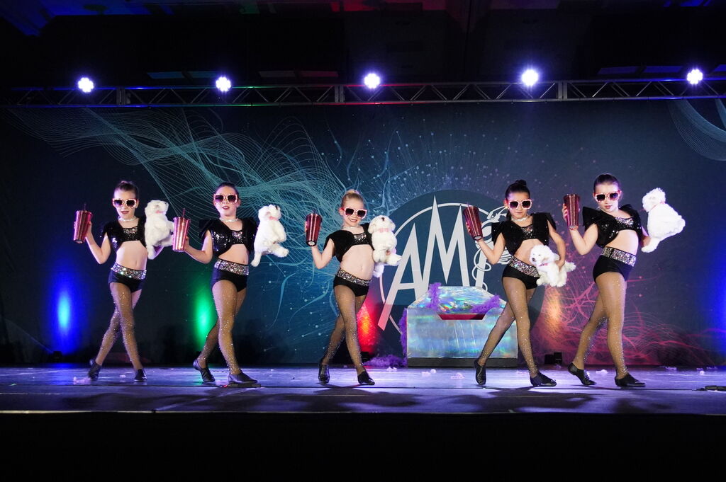 Elegant ballet dancers in classic recital at Moves Dance Studio
